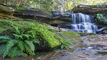 Waterfall cascading over rocks © Douglas Cliff