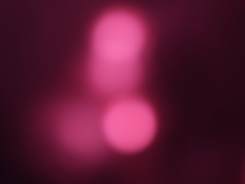 Una toma de cerca de una fondo abstracto de luces de navidad de color rojo en la oscuridad. Desenfoque bokeh

