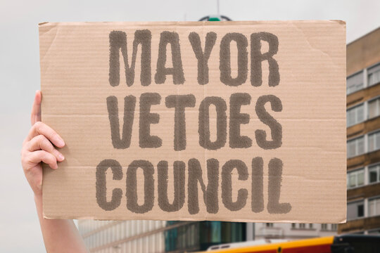 "Mayor Vetoes Council" A mayor uses veto power to block a city council decision. MAYOR. VETO. COUNCIL. LOCAL. POWER.