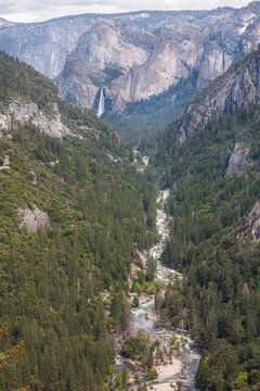 Vertical view of Yosemite valley canyon with Merced river and Illilouette Fall