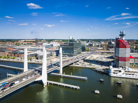 Aerial view of Hisingsbron bridge spanning the Gota Alv river with modern buildings and urban infrastructure in Goteborg, Vastra Gotalands lan, Sweden.