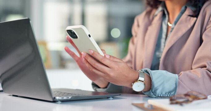 Cellphone, laptop and hands of businesswoman in office with email update on finance report planning. Typing, technology and financial advisor with phone for texting feedback on investment growth.