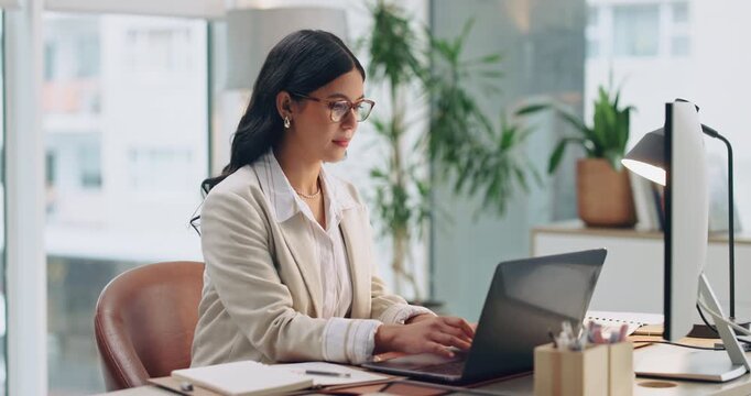 Office, creative and business woman on laptop for marketing proposal, research and strategy. Reading, typing and person on computer for planning, brand promotion and email campaign for advertising