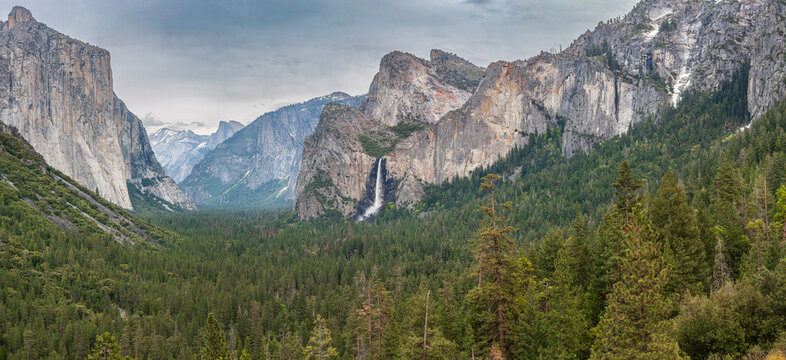 Beautiful wide panoramic view of Yosemite Valley with El Capitan and waterfall