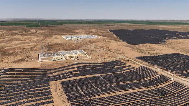 Aerial View of Utility-Scale Battery Energy Storage System and Substation in Arid Northwest China Desert