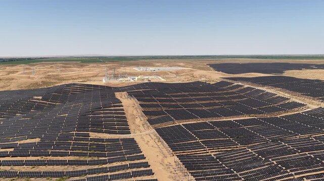Aerial View of Utility-Scale Battery Energy Storage System and Substation in Arid Northwest China Desert