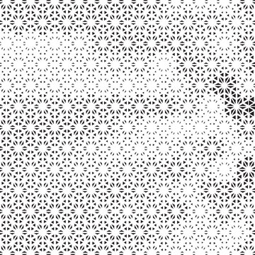 Seamless geometric pattern with intricate circular mandala shapes in black and white.