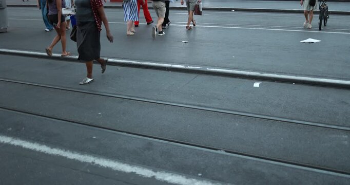 People walking at tram station in the city - Urban lifestyle concept