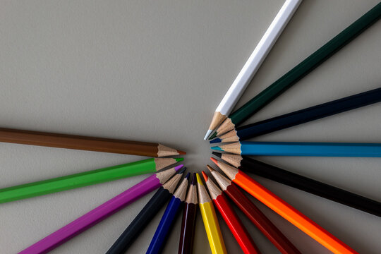 Colorful Pencils Form a Circle with Their Tips Pointing Inward