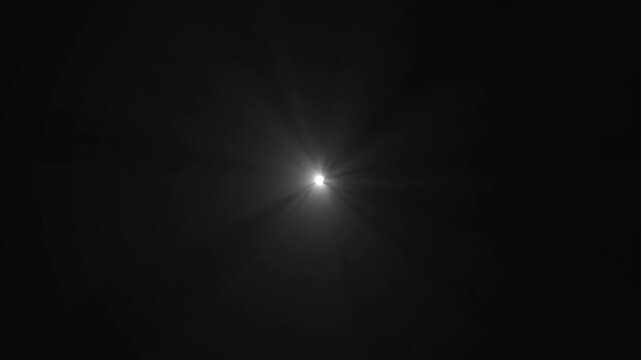  White sun flare star light glow shining rays effect on black Radiant light bursting forth from a central point in a seamless . sun rays or god bless rays' effect.