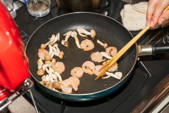 Cooking Shrimp and Mushrooms in Frying Pan