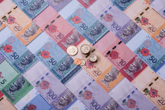 Malaysian ringgit banknotes as a tool for trade and financial transactions. The Malaysian ringgit
