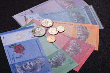 Malaysian ringgit banknotes as a tool for trade and financial transactions. The Malaysian ringgit © chernikovatv