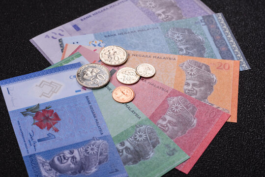 Malaysian ringgit banknotes as a tool for trade and financial transactions. The Malaysian ringgit