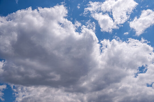 Blue Sky With Fluffy Cumulus Clouds