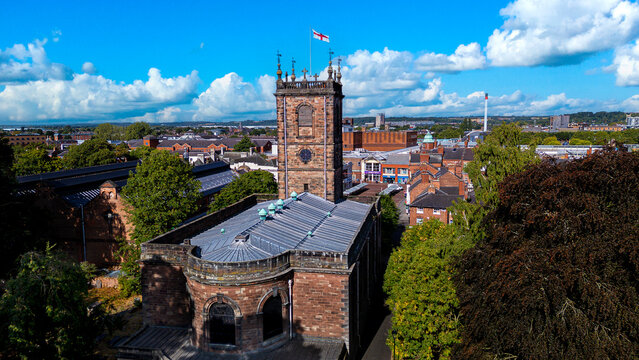 Aerial view of St Modwen church tower overlooking Burton townscape