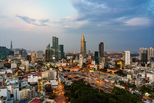 Cityscape of Ho Chi Minh City, Vietnam at dusk.