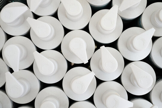 Close-up of some soap dispenser bottles.