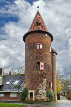 Historic Wedemhoveturm tower stands in Borken, Germany. Winter daylight under a partly cloudy sky