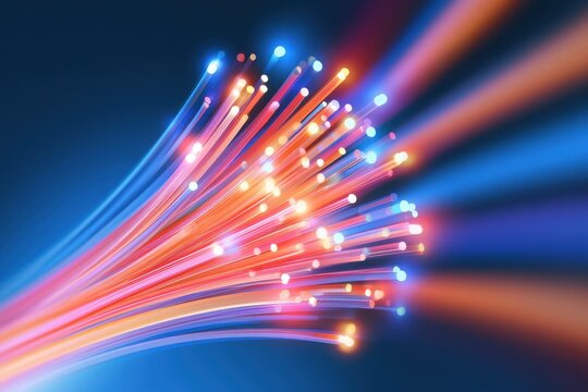 Glowing fiber optic cables with colorful light points against dark blue background