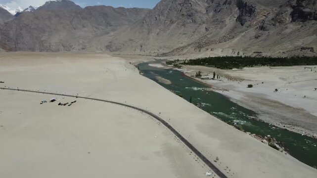 Indus River flows between the Karakoram and Himalayas at Skardu, Pakistan