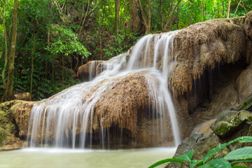 Beautiful waterfall in Erawan waterfall National Park in Kanchanaburi, Thailand. © ckDome