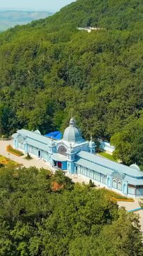 Vertical video. Zheleznovodsk, Russia. Pushkin gallery. Spa park. City Resort. Drone footage, Point of interest. Rich colors