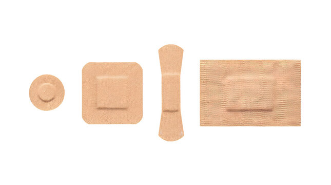 Adhesive fabric bandages set in neutral skin tone skin colors.