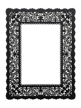 Black laser cut paper frame with intricate gothic ornaments.