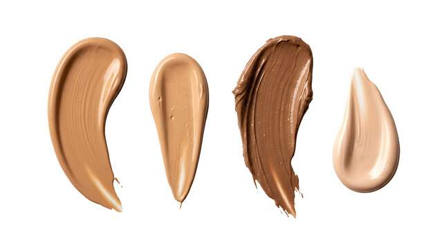 Cosmetic foundation cream smears in different skin tone hues.