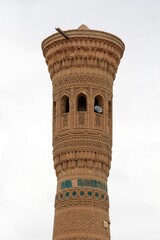 The minaret located in the city of Vobkent, Uzbekistan, was built in 1198 during the Karakhanid period. The brick minaret features traditional motifs. © Ahmet
