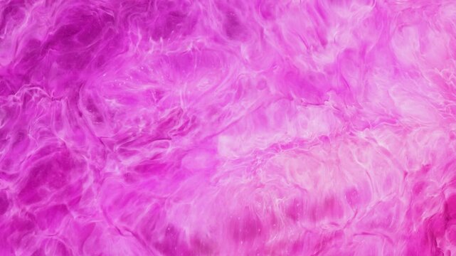 Mixing different colors of alcohol ink in a close-up view