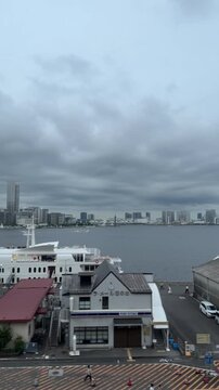Overcast bay view with warehouses in Tokyo Minato
