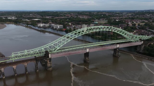 Aerial view of the silver jubilee bridge spanning the river mersey in runcorn