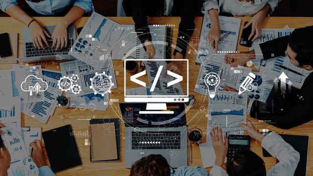 A dynamic office scene illustrates a diverse group of professionals collaborating on data analysis and strategic planning, showcasing modern technology and teamwork. Raster