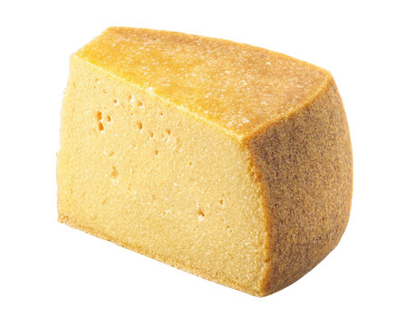 Close up view of natural aged cheese block with textured surface transparent background