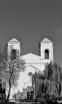 Symmetrical monochrome facade view of the historic Catholic Church of the Exaltation of the Holy Cross in Brest, Belarus