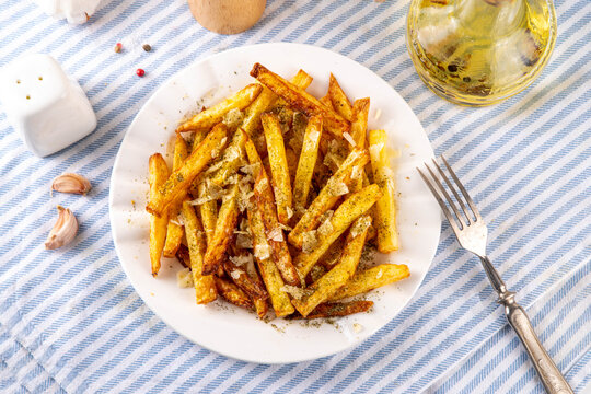 Homemade Garlic Parmesan French Fries, Air Fried Potato Wedges with Grated Parmesan, Garlic, Dried Herbs, tasty viral food recipe