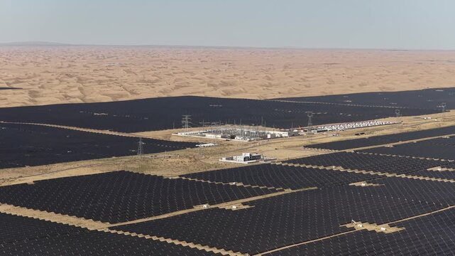 Aerial View of Utility-Scale Solar Farm with Battery Energy Storage System in Arid Desert