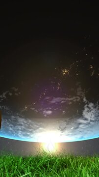 Animation of spinning globe over football ball on grass