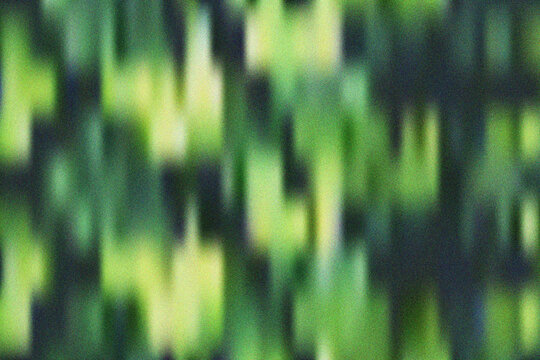 Lush green abstract arrangement with varying shades of vibrant greens and soft yellows in a textural mosaic