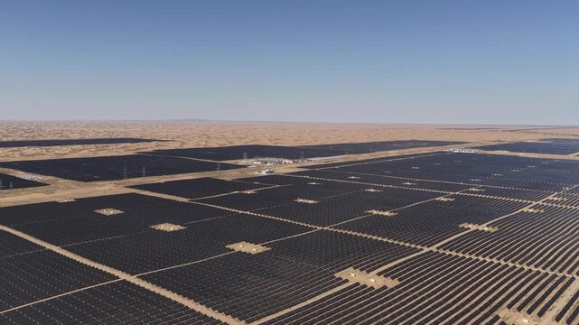 Aerial View of Utility-Scale Solar Farm with Battery Energy Storage System in Arid Desert