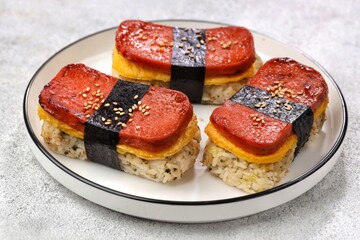 Classic Hawaiian spam musubi, made with grilled spam, seasoned rice, and wrapped with nori seaweed © Noor