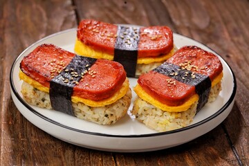 Classic Hawaiian spam musubi, made with grilled spam, seasoned rice, and wrapped with nori seaweed © Noor
