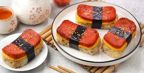 Classic Hawaiian spam musubi, made with grilled spam, seasoned rice, and wrapped with nori seaweed © Noor