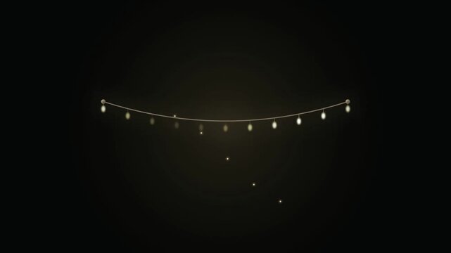 A string of glowing fairy lights suspended against a dark background.