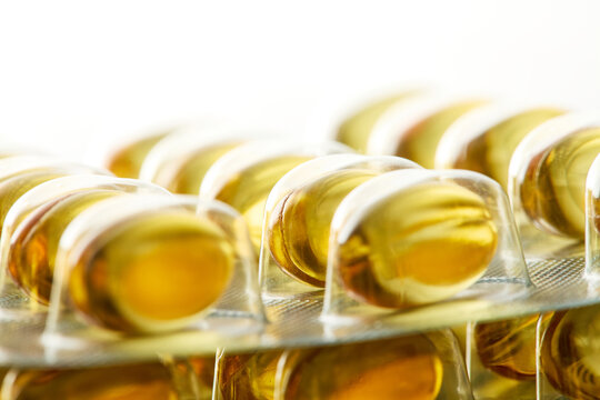 Golden Softgel Capsules in Blister Pack
