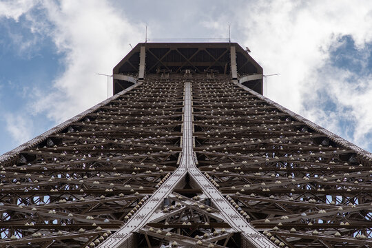 Eiffel tower, Paris. Unusual angle of the Eiffel tower, buttom to top view