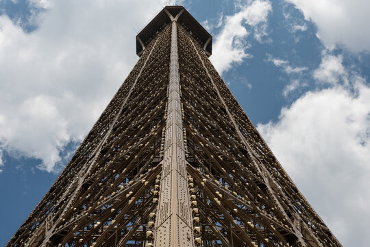 Eiffel tower, Paris. Unusual angle of the Eiffel tower, buttom to top view