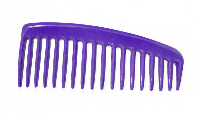 A bright purple hair comb used for styling and grooming thick hair strands